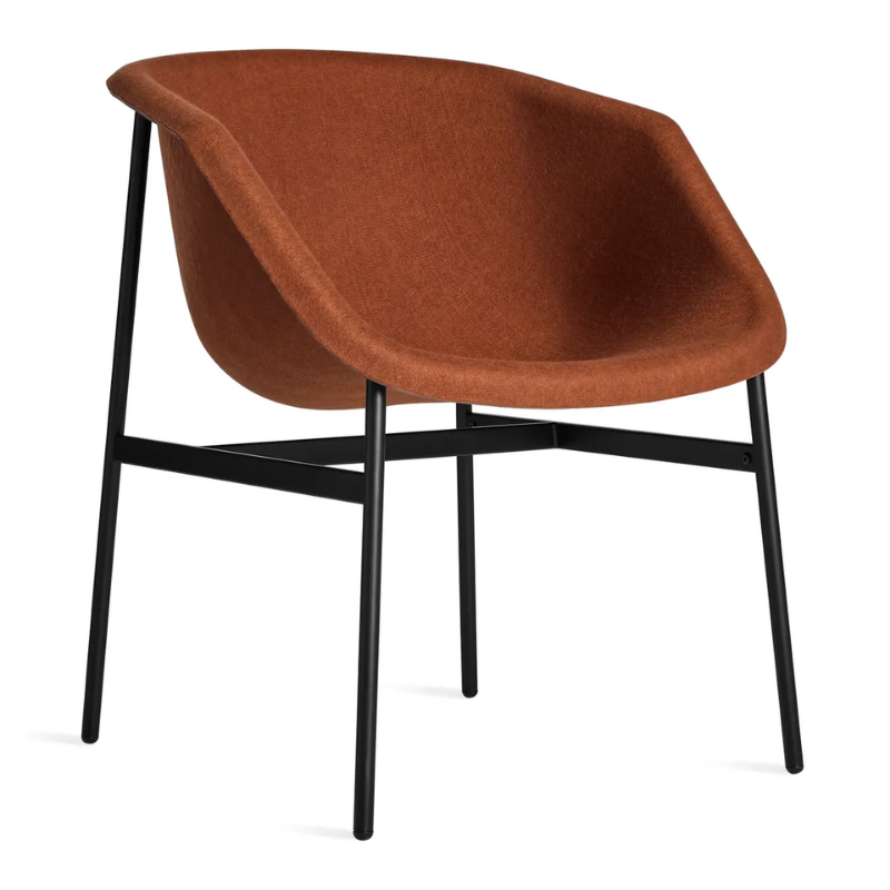 The Past Life Chair from Blu Dot with copper seat and black base from an angle.