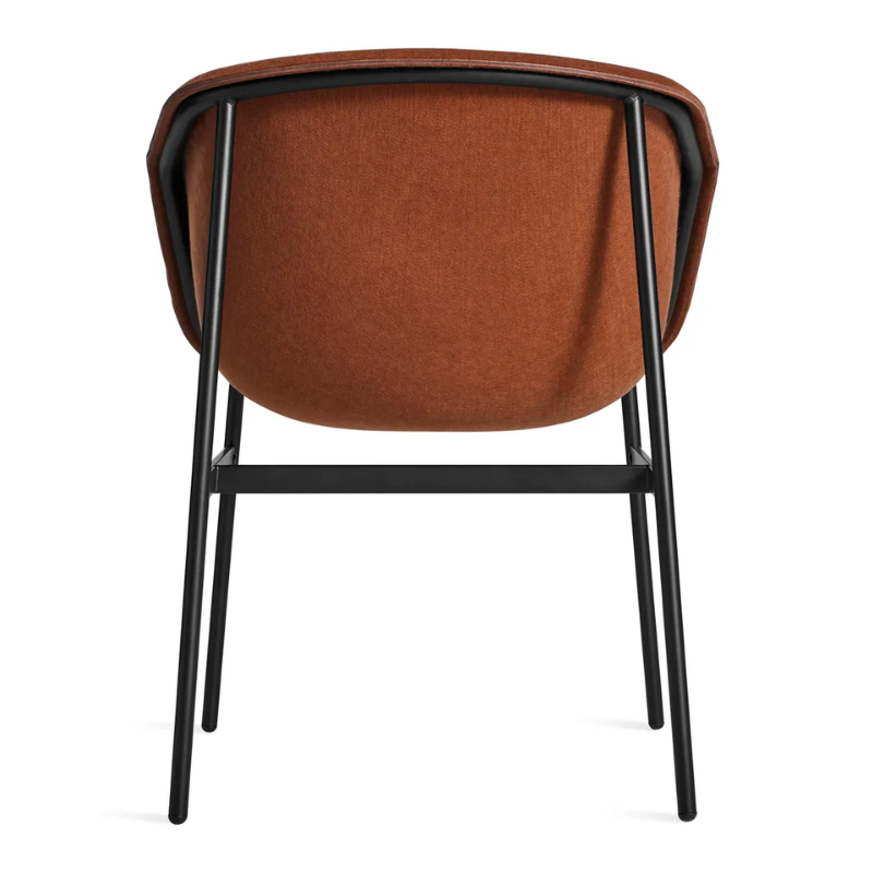 The Past Life Chair from Blu Dot with copper seat and black base from the back.