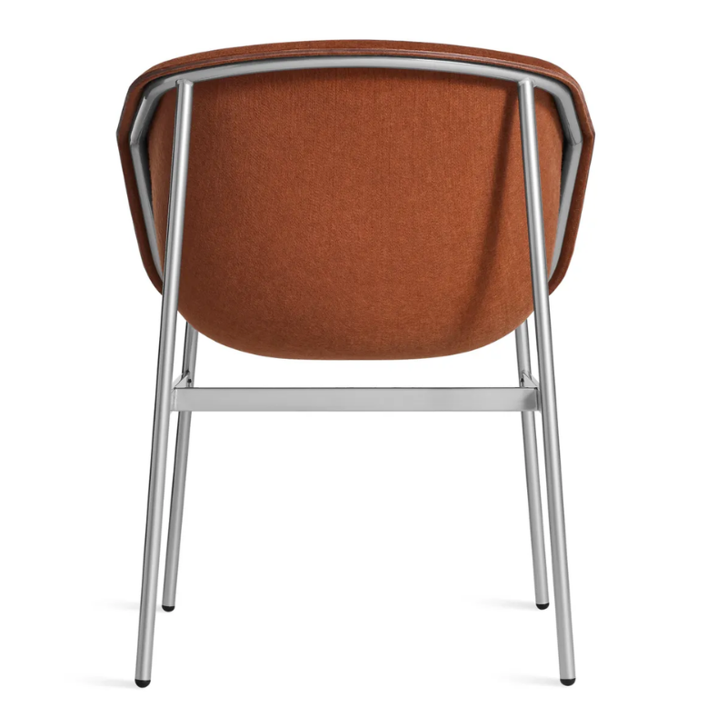 The Past Life Chair from Blu Dot with copper seat and silver base from the back.