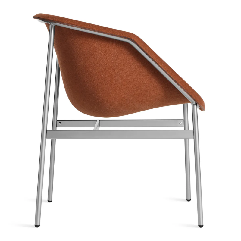 The Past Life Chair from Blu Dot with copper seat and silver base from the side.