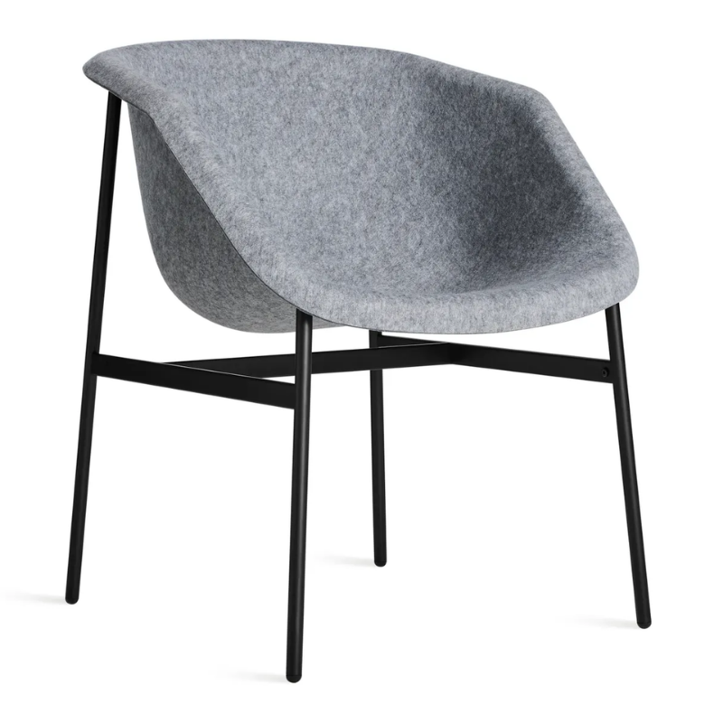 The Past Life Chair from Blu Dot with light grey seat and black base from an angle.