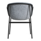 The Past Life Chair from Blu Dot with light grey seat and black base from the back.