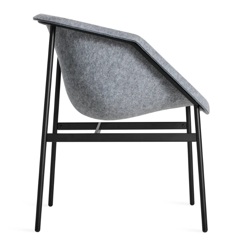 The Past Life Chair from Blu Dot with light grey seat and black base from the side.