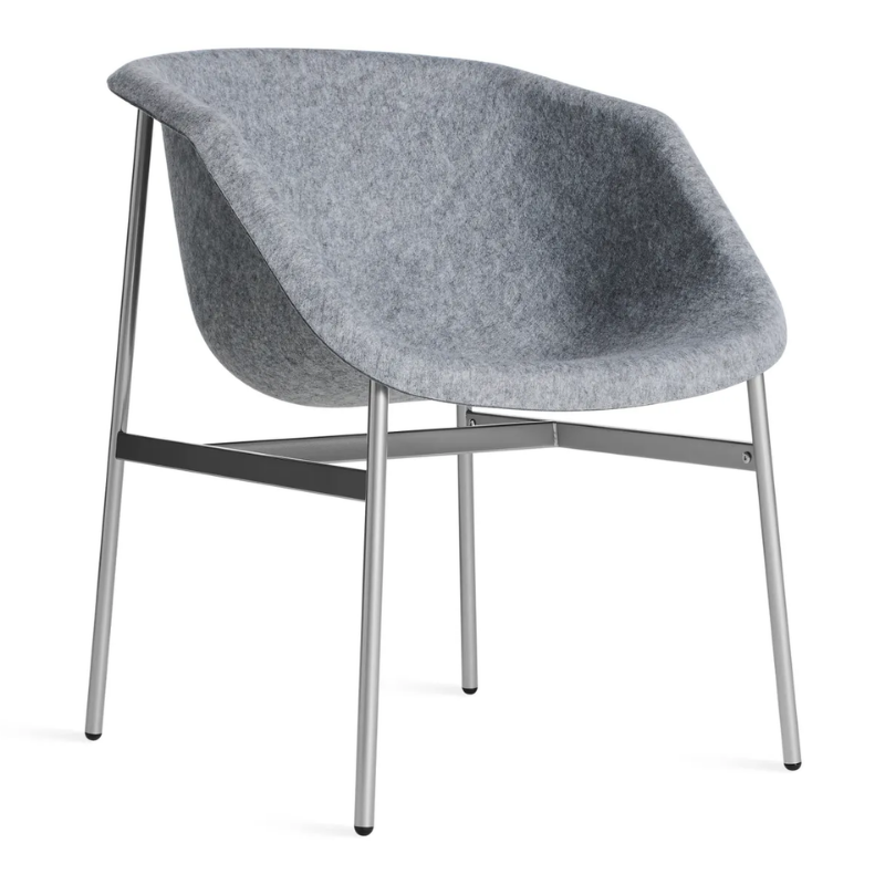 The Past Life Chair from Blu Dot with light grey seat and silver base from an angle.