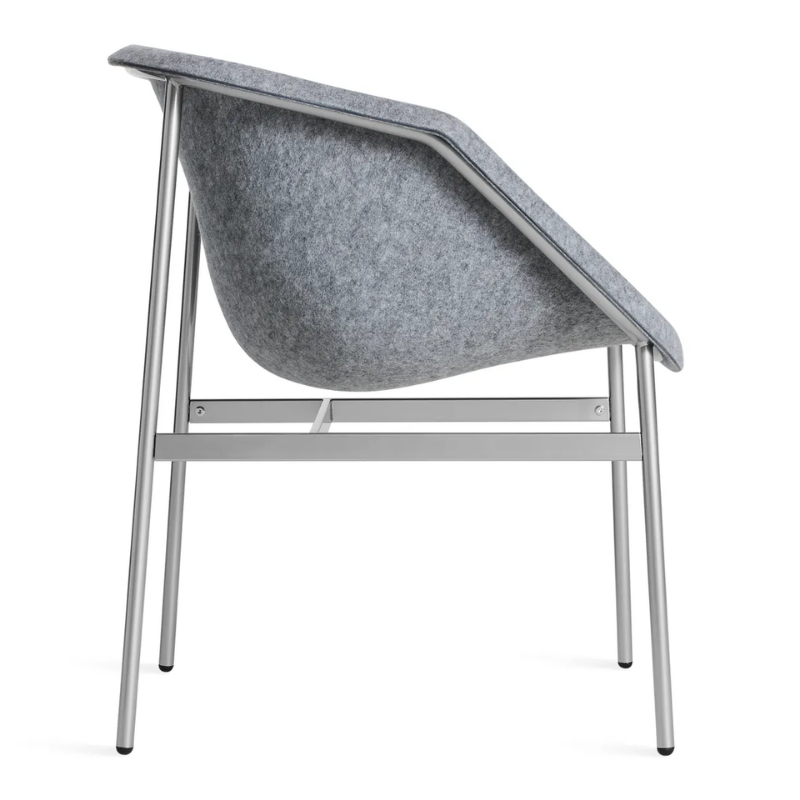 The Past Life Chair from Blu Dot with light grey seat and silver base from the side.