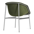 The Past Life Chair from Blu Dot with olive seat and silver base from the back at an angle.