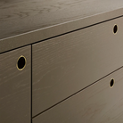 The Peek 1 Door / 3 Drawer Credenza from Blu Dot in dark olive close up.