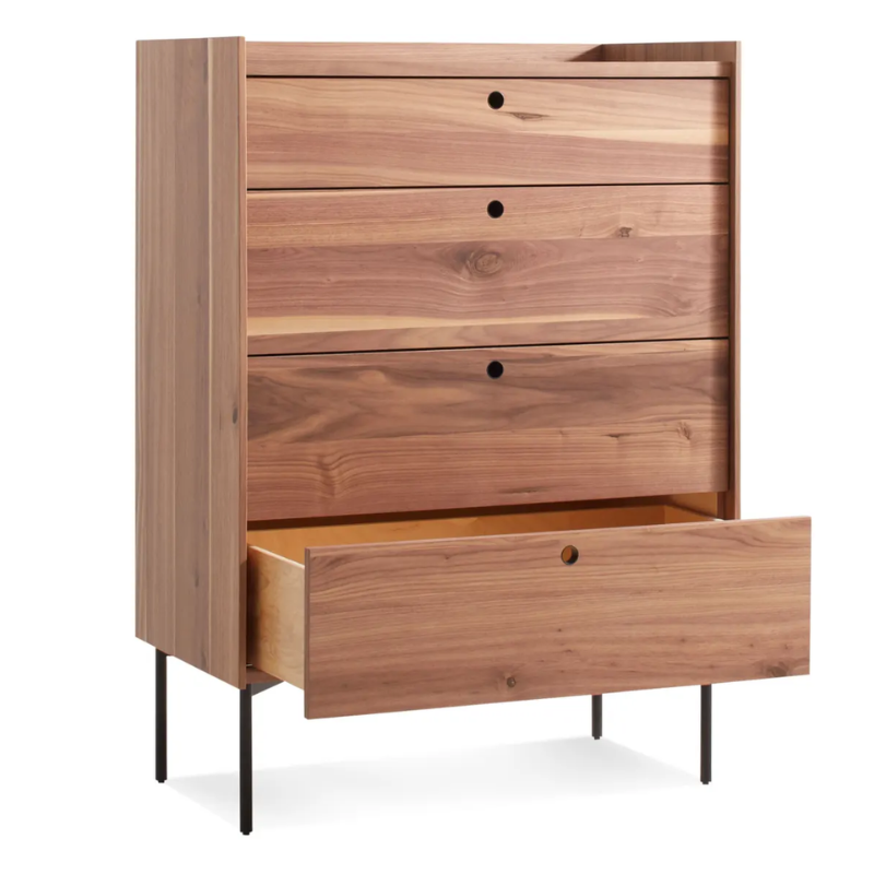 The Peek 4 Drawer Dresser from Blu Dot in rustic walnut with the lower drawer opened.