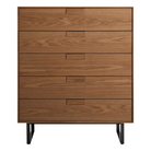 The Series 11 5 Drawer Dresser from Blu Dot in walnut with oblivion legs.