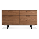 The Series 11 6 Drawer Dresser from Blu Dot in walnut with oblivion legs.