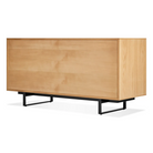 The Series 11 6 Drawer Dresser from Blu Dot in white oak with oblivion legs from the back at an angle.