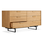 The Series 11 6 Drawer Dresser from Blu Dot in white oak with oblivion legs with an open drawer.