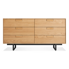 The Series 11 6 Drawer Dresser from Blu Dot in white oak with oblivion legs.