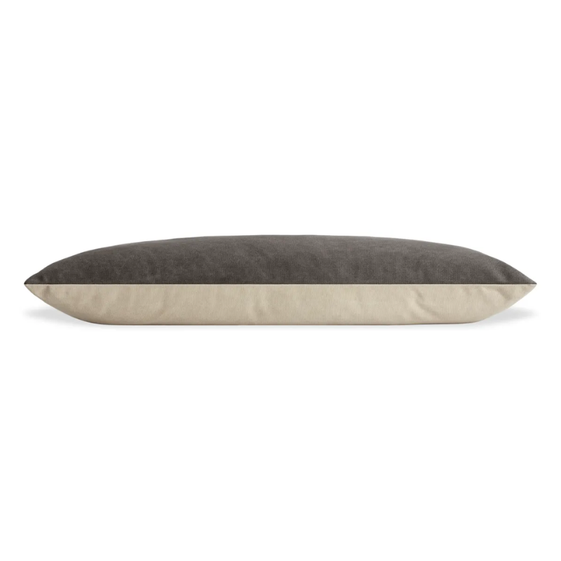 The large Signal Dog Bed from Blu Dot with barto charcoal upholstery from the side.