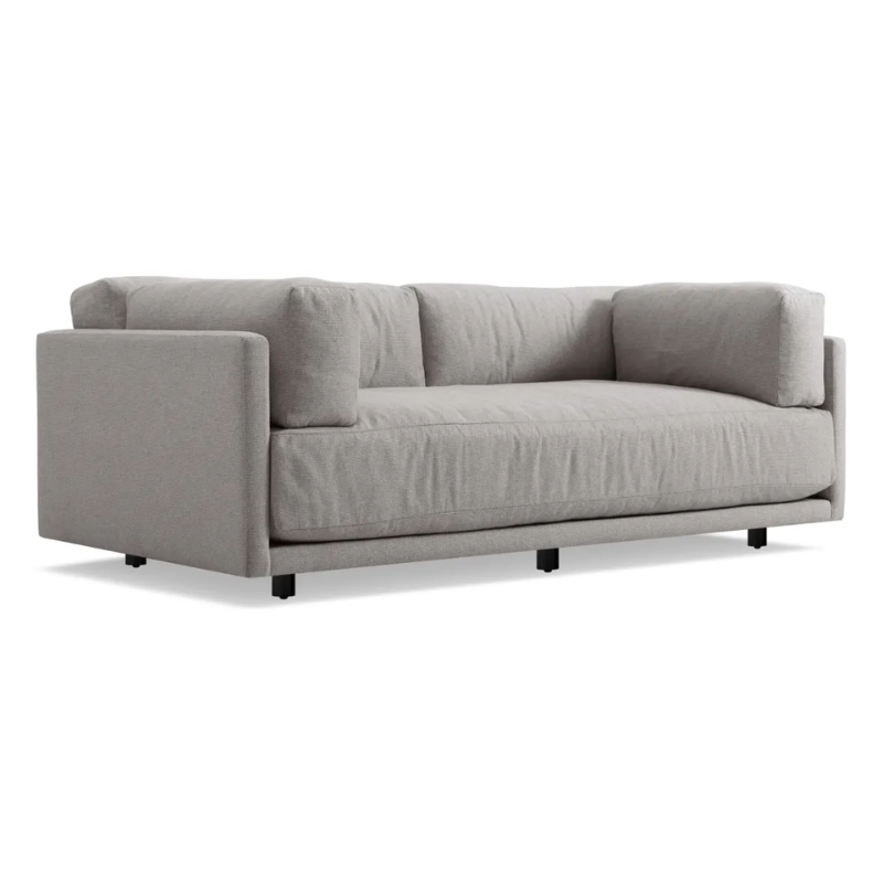 The Sunday 82 inch Sofa from Blu Dot in agnew grey from an angle.