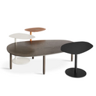 The Swole Small Table from Blu Dot in a studio showing the Swole collection.