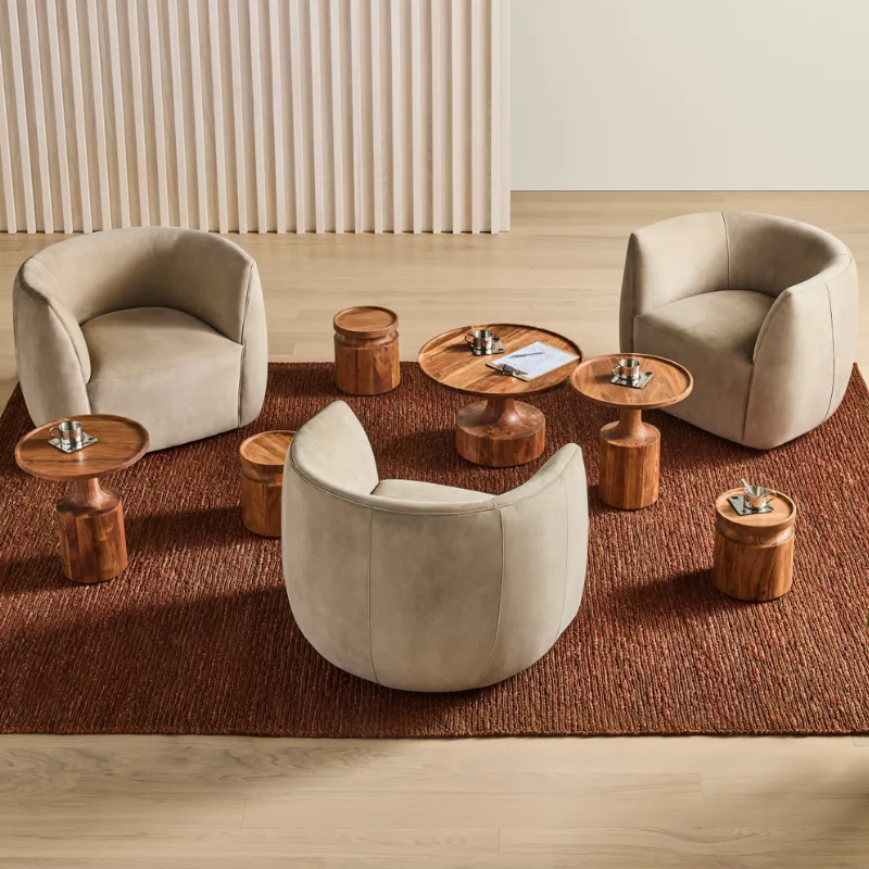 The Turn Coffee Table from Blu Dot in a family area with other pieces in the Turn Collection.