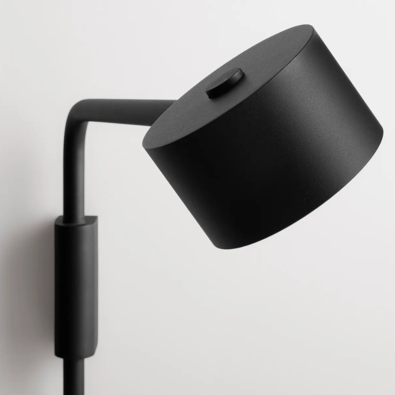 The Verge Adjustable Sconce by Blu Dot in black switch detail