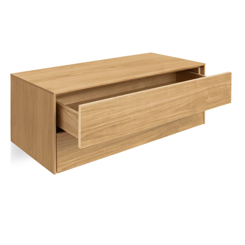 The Wonder Wall 2.0 2 Drawer Cabinet from Blu Dot in white oak from an angle with an open drawer.