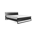 The king-size Woodrow Bed from Blu Dot made with black on ash.