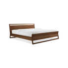 The king-size Woodrow Bed from Blu Dot made with walnut.