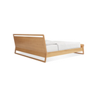 The king-size Woodrow Bed from Blu Dot made with white oak from the back at an angle.