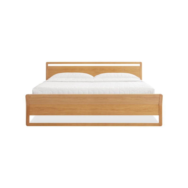 The king-size Woodrow Bed from Blu Dot made with white oak from the foot of the bed.