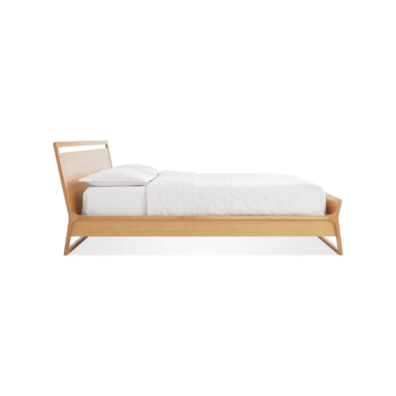 The king-size Woodrow Bed from Blu Dot made with white oak from the side.