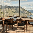 Eikund dining chair oak with black leather seat pad with Oya dining table in restaurant 