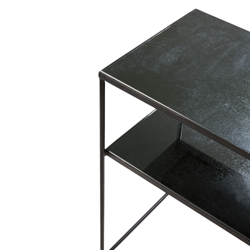 The Aged Sofa Console from Ethnicraft in charcoal focusing on the table top.