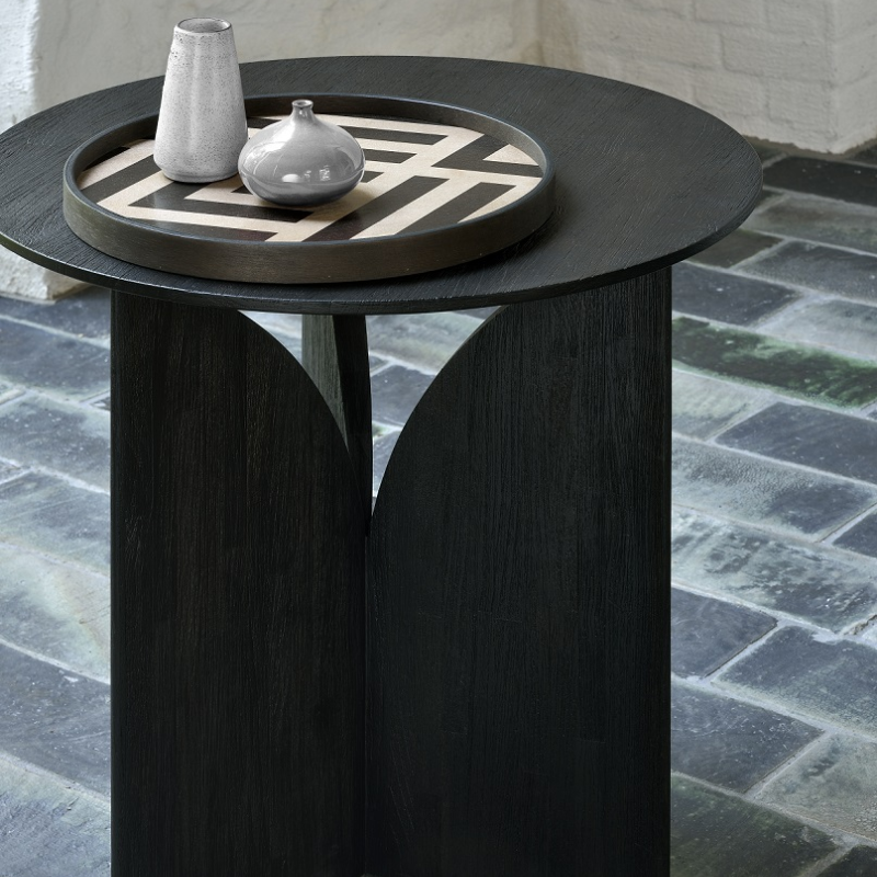 The Fin Side Table from Ethnicraft in a lounge.