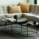 The Nesting Coffee Table Set from Ethnicraft in a lounge.