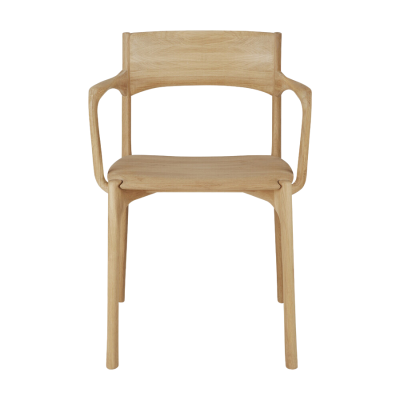 The PI Dining Chair from Ethnicraft with an armrest from the front.