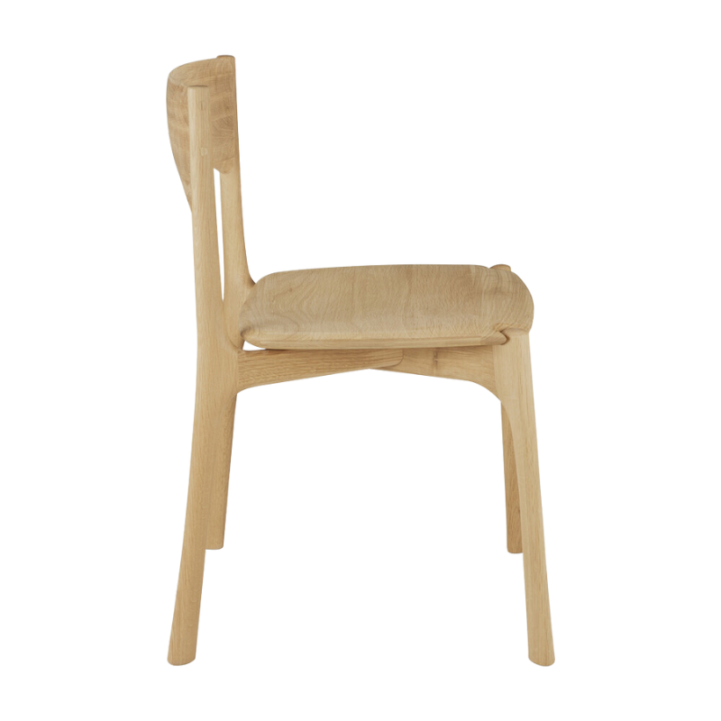 The PI Dining Chair from Ethnicraft without an armrest from the side.