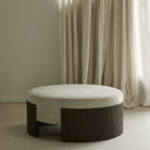 The Roller Max Pouf from Ethnicraft 33.5 inch size in a lounge.