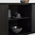 The Roller Max Sideboard from Ethnicraft in a dining room.