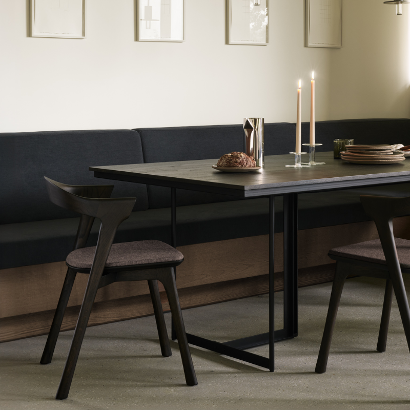 The Tacet Dining Table from Ethnicraft in a kitchen and dining setting.