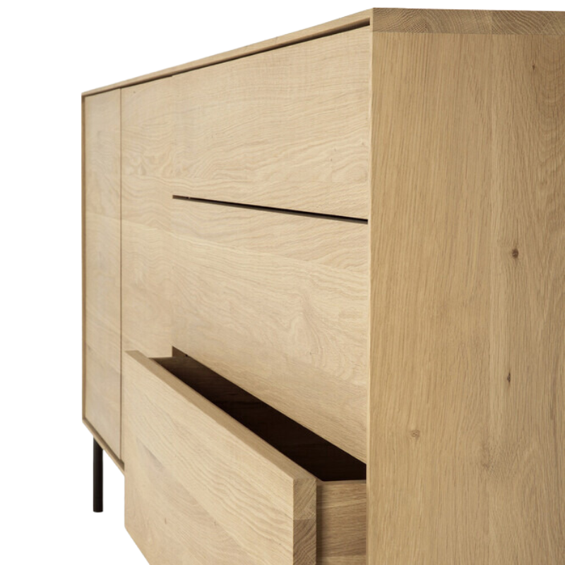 The Whitebird Sideboard from Ethnicraft 71 inch with an open drawer.