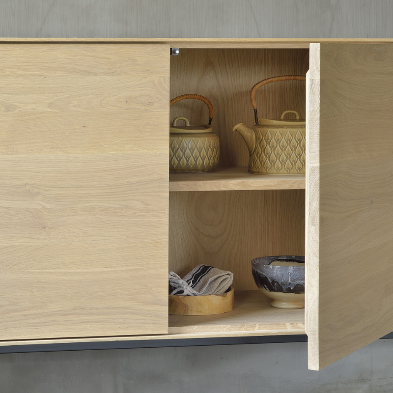 The Whitebird Sideboard from Ethnicraft in a kitchen and dining setting.