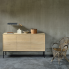 The Whitebird Sideboard from Ethnicraft in a living room.