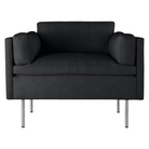 The Bolster Armchair from Herman Miller in heathered black, cozy upholstery.