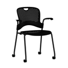 The Caper Stacking Chair from Herman Miller in black with fixed arms and multi-floor casters.