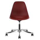 The Eames Molded Plastic Task Side Chair from Herman Miller in brick red.