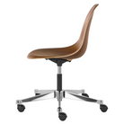 The Eames Molded Plywood Task Side Chair from Herman Miller in walnut from the side.