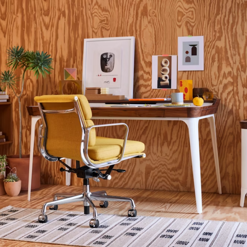 The Eames Soft Pad Management Chair from Herman Miller in a home.