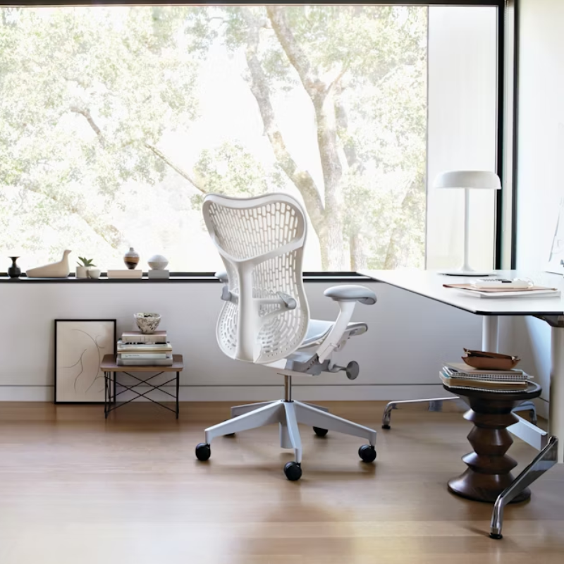 The Mirra 2 Chair from Herman Miller in alpine in a home.