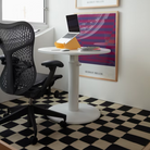 The Mirra 2 Chair from Herman Miller in graphite in an office.