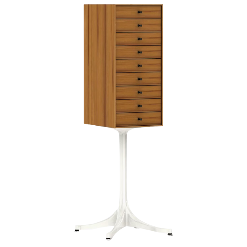 The Nelson Miniature Chest 9 Drawer from Herman Miller in teak with a studio white base and black pulls.