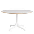 The Nelson Pedestal Coffee Table from Herman Miller with white table top and white base.