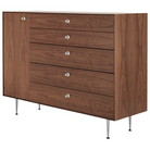 The Nelson Thin Edge Chest Cabinet from Herman Miller in walnut with left orientation from the side.